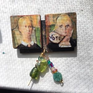 Hand painted brooch/pin artwork & the words “VOTE”